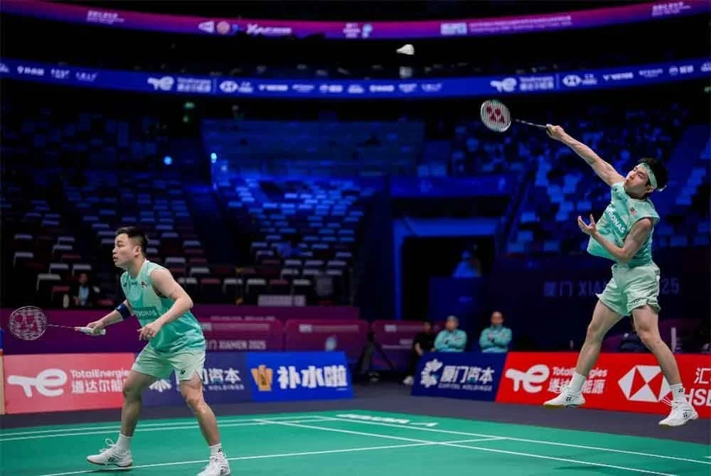 Wooi Yik (kanan) dan Aaron perlu terus berusaha untuk meningkatkan prestasi. Foto Xinhua