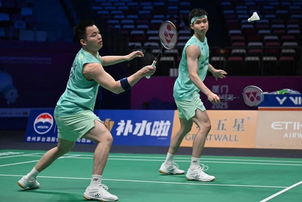 Aaron (kiri) dan Wooi Yik tekad tebus kecewa pada kejohanan akan datang. Foto AFP