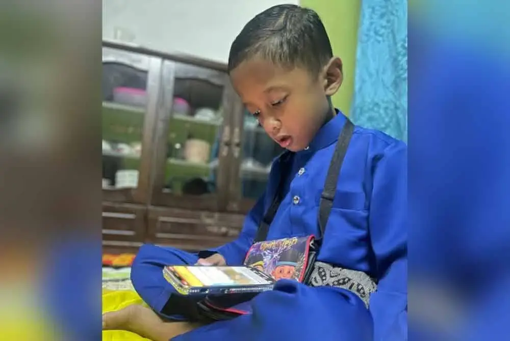 Gambar Muhamad Harris Rayyan yang diambil ketika sambutan Hari Raya Aidilfitri baru-baru ini.