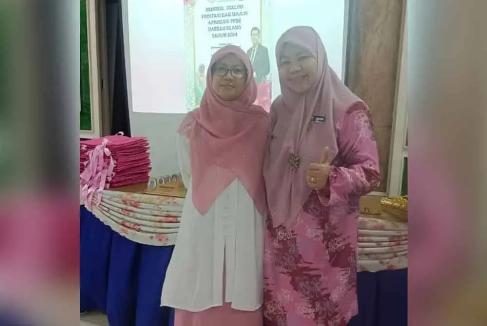 Sabariah (kanan) merupakan seorang pendidik di salah sebuah sekolah di Klang, Selangor.