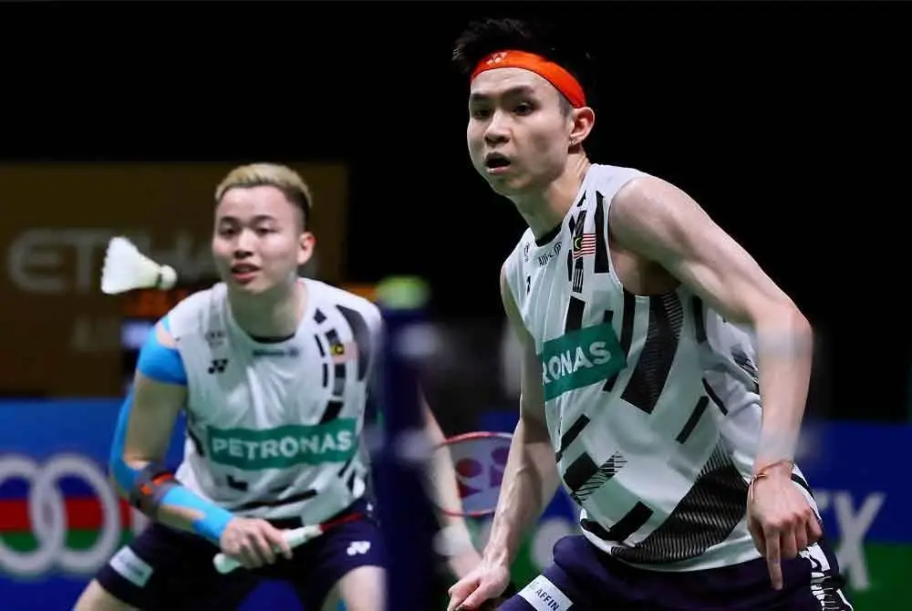 Wooi Yik (kanan) dan Aaron mahu menikmati setiap aksi tanpa sebarang tekanan dalam saingan Masters Malaysia di Bukit Jalil bermula Selasa. Foto Agensi.