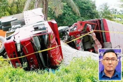 Trak FRU dan lori yang terbabit kemalangan di Jalan Chikus-Sungai Lampam, Perak pada Selasa lalu. Gambar kecil: Daniel