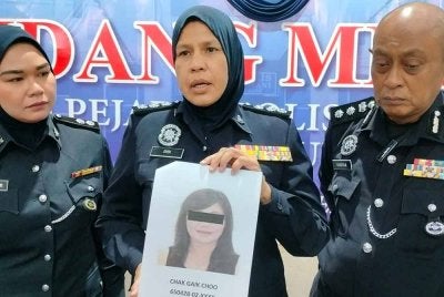Hanyan (kanan) meminta orang ramai menyalurkan maklumat tentang wanita bagi membantu siasatan kes penipuan pelaburan.