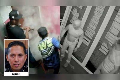 Tangkap layar rakaman CCTV memaparkan dua individu memecah masuk sebuah sekolah agama di Bukit Jelutong, Shah Alam baru-baru ini.
