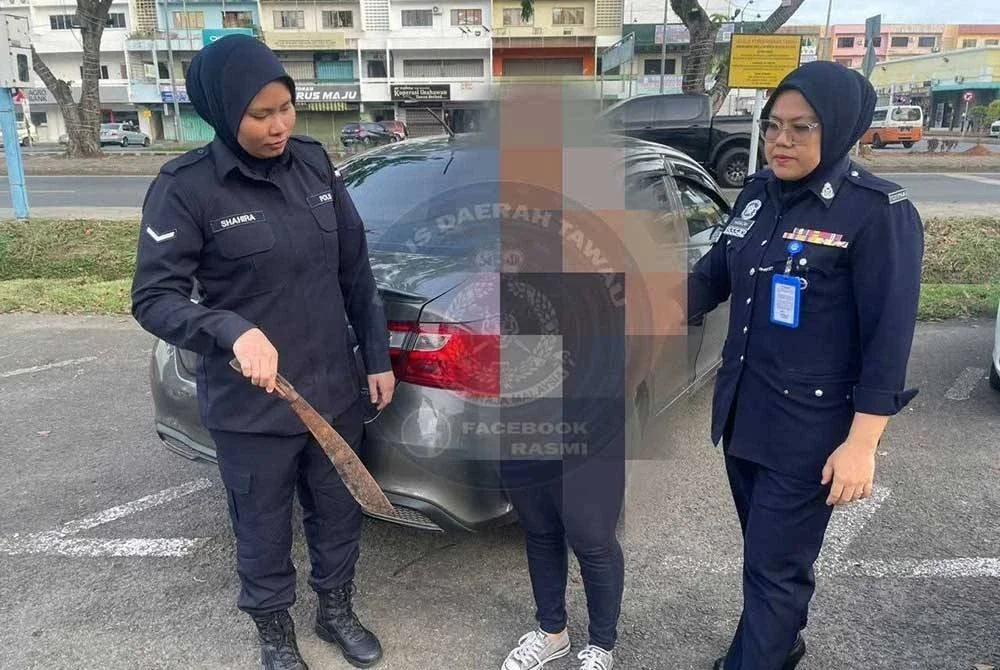 Suspek ditahan bersama parang dalam kejadian di bandar Tawau.