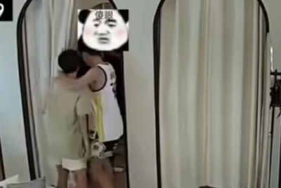 Tangkap layar kejadian yang dirakamkan oleh kamera litar tertutup di premis pakaian berkenaan.