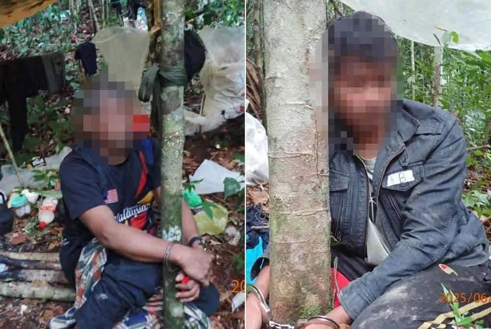 Dua warga Kemboja ditahan dalam Ops Telah selepas didapati menceroboh kawasan Taman Negeri Kenyir tanpa permit sah. FOTO: MPTN
