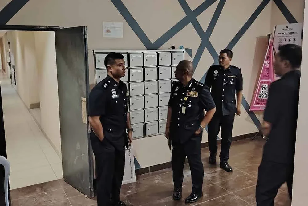 Polis padaKhamis, melakukan tinjauan semula di lokasi kejadian kes pembunuhan seorang penuntut universiti.