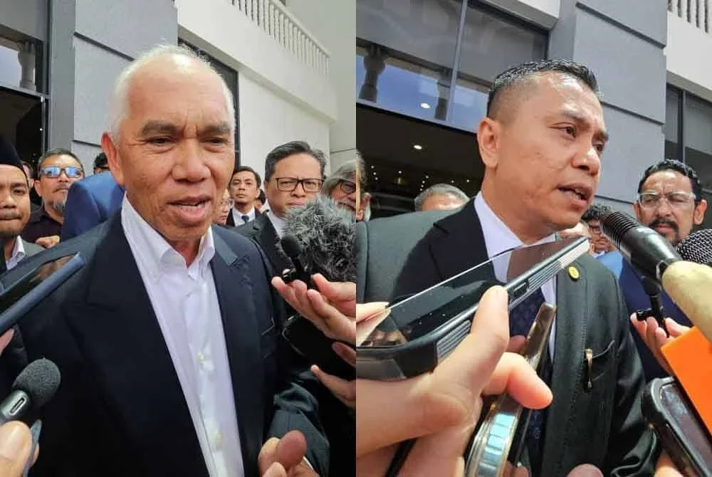 Yusof (kiri) dan Andi Muhammad Suryady ketika ditemui pemberita di luar mahkamah pada Isnin