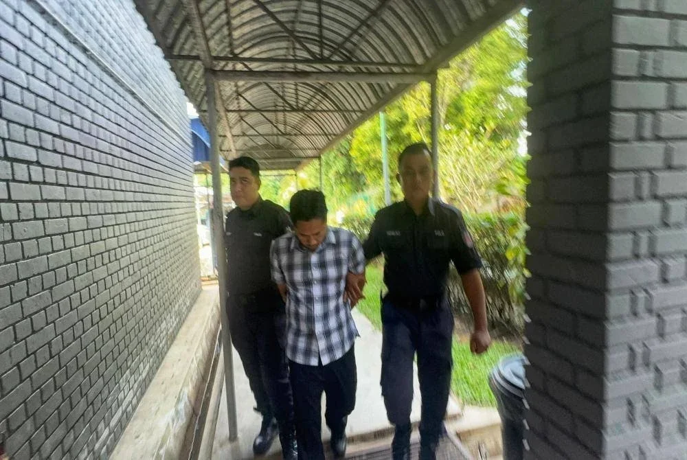 Tertuduh mengaku tidak bersalah tiga pertuduhan memiliki bahan penganiayaan seksual terhadap kanak-kanak. Foto Ihsan PDRM