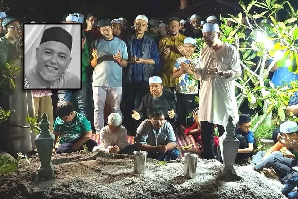 Tiga anak Allahyarham memberikan penghormatan terakhir ketika pengebumian jenazah di Tanah Perkuburan Islam Sheikh Ibrahim, Jalan Pusara, Kuala Terengganu pada malam Rabu. (Gambar kecil: Allahyarham Wan Hasbullah)