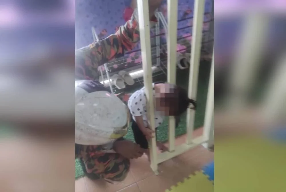 Kanak-kanak tersepit kepalanya di celah besi penghadang di sebuah taska di Taman Jawi Indah, Nibong Tebal pada Khamis.