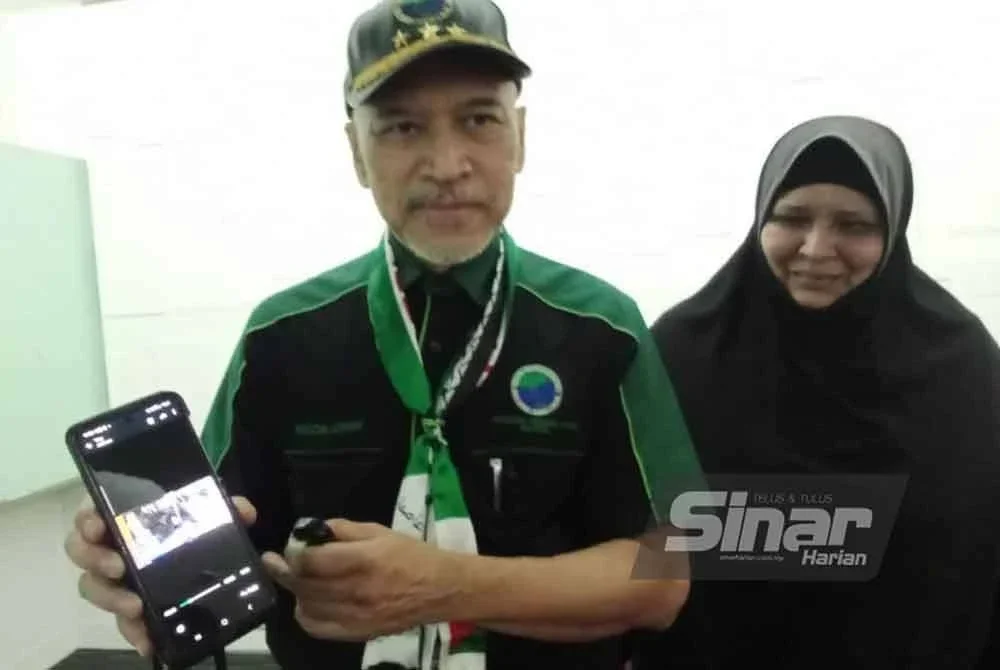 Nadzim menunjukkan rakaman kejadian terbaharu membabitkan ejen tarik kenderaan.