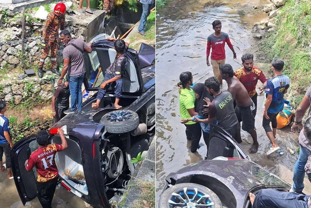 Anggota bomba dengan bantuan orang awam membawa keluar mangsa yang terperangkap dalam Perodua Alza selepas terbabas dan jatuh ke dalam sungai.