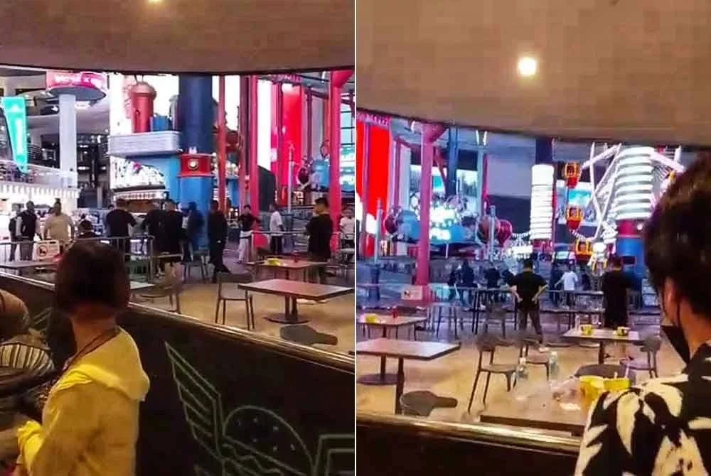 Tangkap layar video tular memaparkan insiden pergaduhan membabitkan sekumpulan lelaki di SkyAvenue, Genting Highlands.