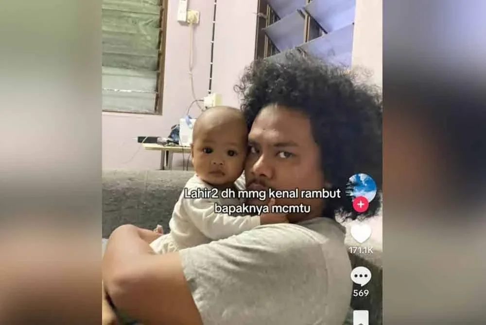 Hakim bersama Adwa sebelum memotong rambut.