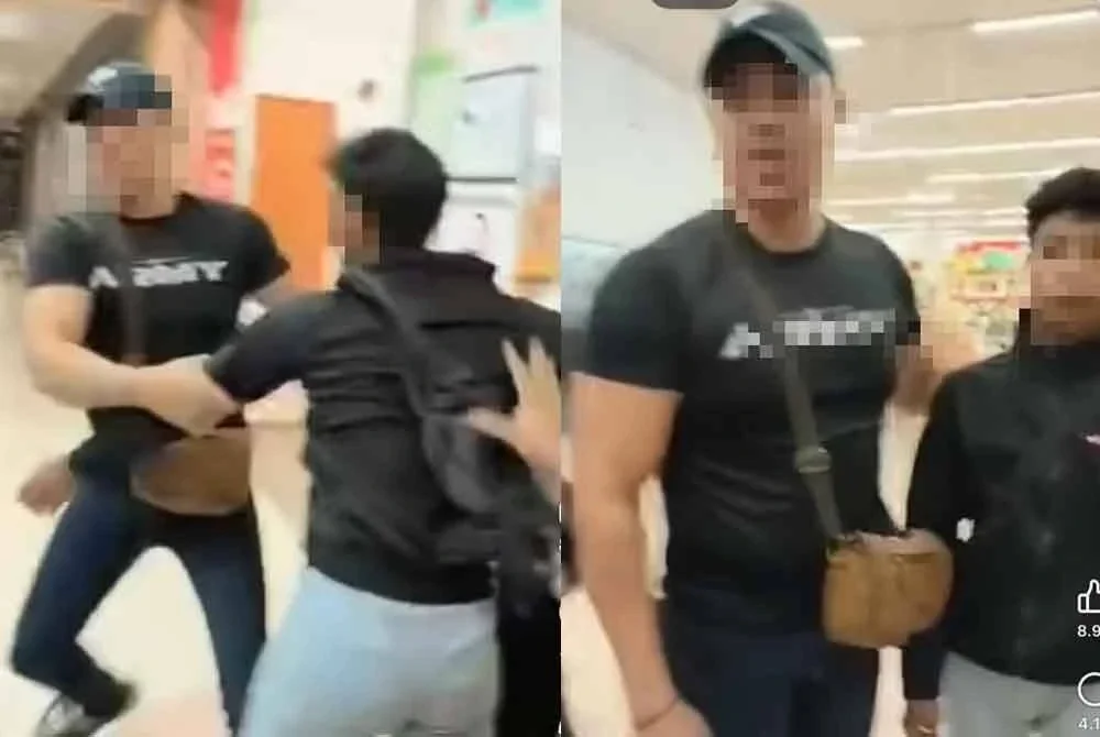 Suspek (kanan) dibantu seorang lelaki dipercayai bapanya melarikan diri dari lokasi selepas kantoi mencuri.