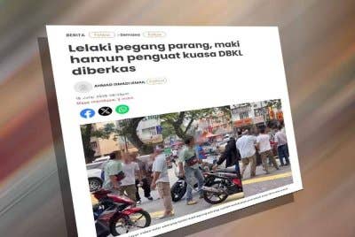 Laporan Sinar Harian mengenai lelaki berparang maki penguatkuasa DBKL.