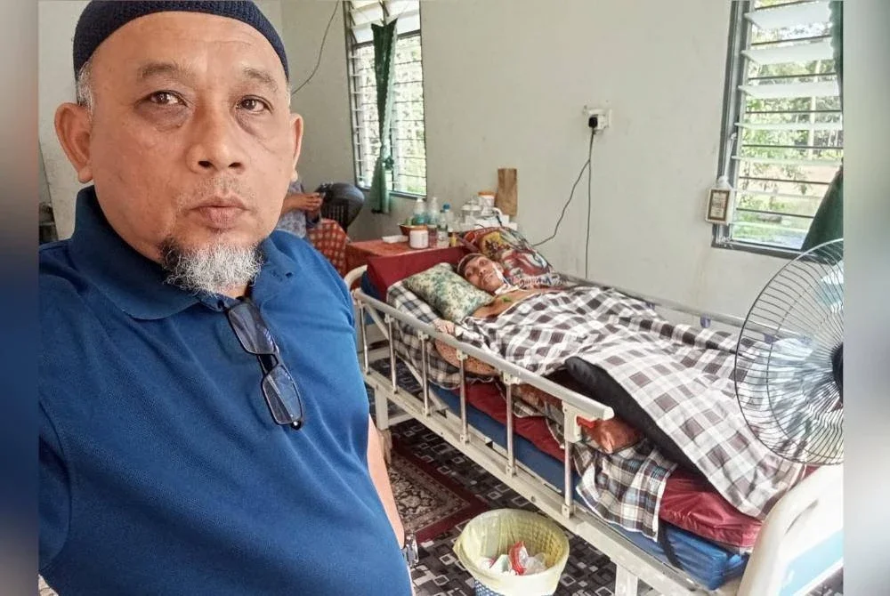 Amran melawat seorang pesakit terlantar di Kampung Labok, Machang