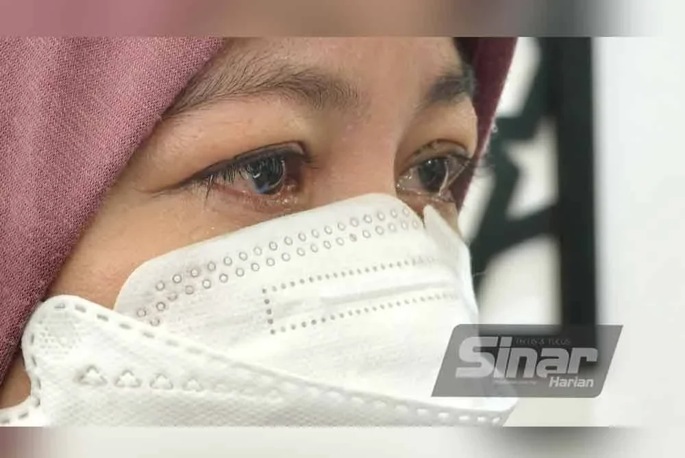 Sayu... Noraidah ibu kepada pelajar perempuan Tingkatan Satu yang meninggal dunia selepas terjatuh dari bangunan asrama sebuah sekolah agama di Papar, baru-baru ini.