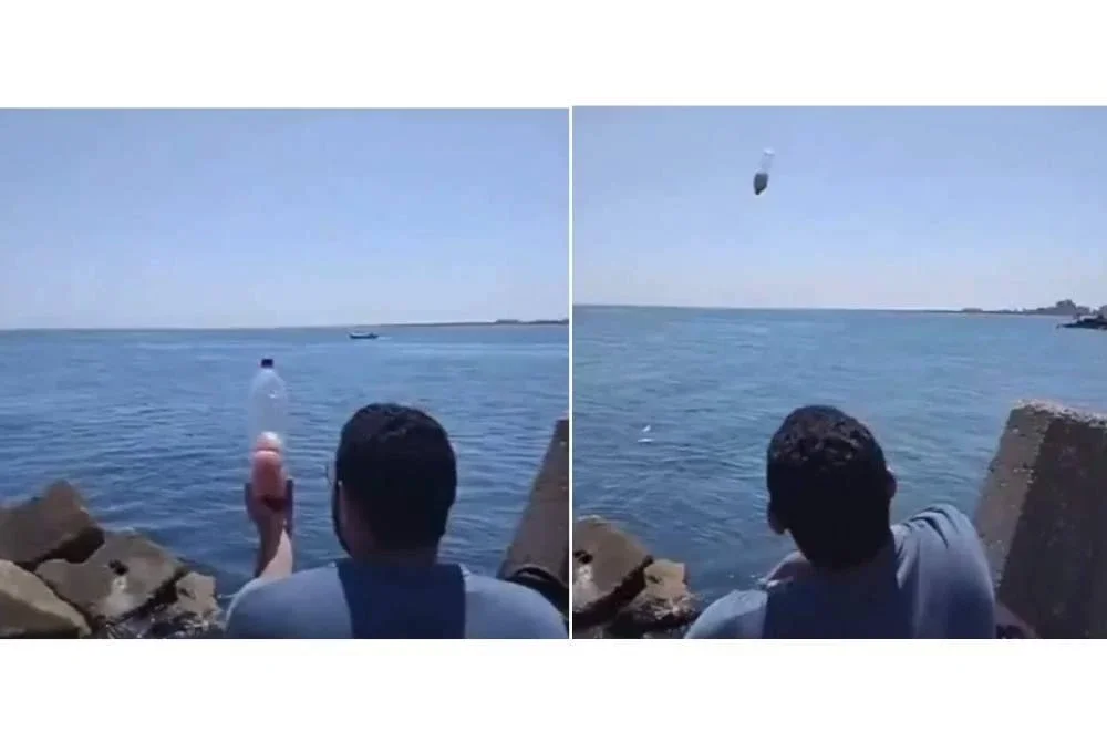 Salah seorang rakyat Mesir membaling botol inisiatif simbolik ‘From Sea to Sea – a Bottle of Hope for Gaza’ sebagai usaha terakhir membantu rakyat Palestin yang berdepan kebuluran melampau akibat sekatan Israel.