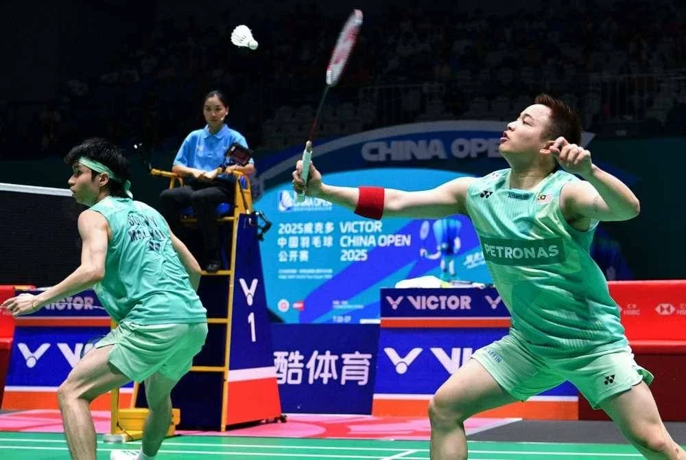 Aaron (kanan) dan Wooi Yik mahu mengalih fokus kepada Kejohanan Badminton Dunia di Paris bulan depan. Foto AFP