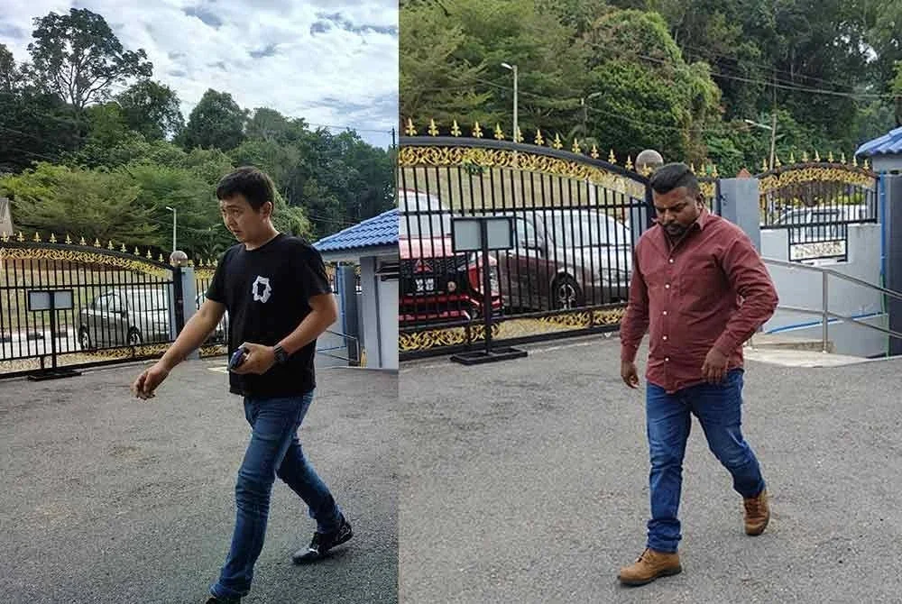 Suren (kanan) dan Wei Foong yang terlibat dalam insiden tular menghalang laluan di Lebuhraya Utara-Selatan (PLUS) arah selatan plaza tol Pedas-Linggi pada 1 Julai lalu, dihadapkan ke Mahkamah Majistret Kuala Pilah pada Rabu.