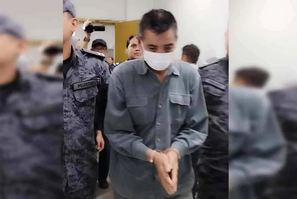 Tertuduh di mahkamah pada Jumaat.