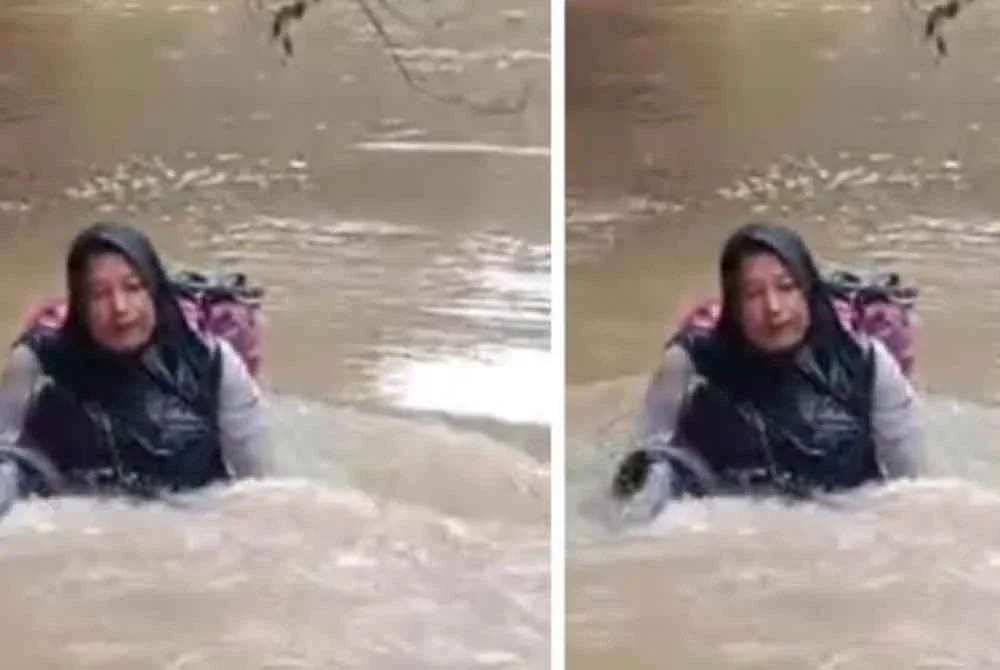 Dona sanggup mempertaruhkan nyawa apabila jambatan penghubung yang sepatutnya dilalui roboh akibat dihanyutkan arus sungai. - Foto: Media sosial