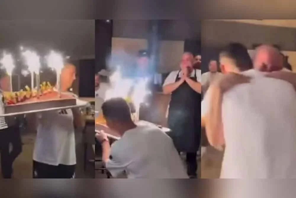 Ronaldo ketika melakukan kejutan hari jadi kepada cef Al Nassr. - Foto: Agensi