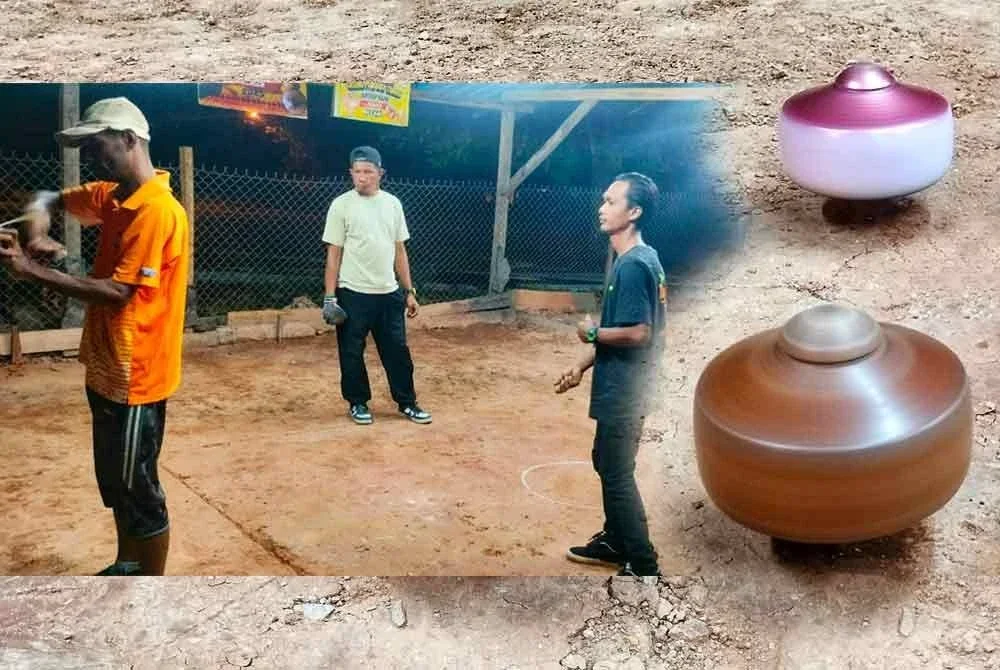 Penduduk pelbagai peringkat usia bermain gasing di Kampung Kujan, Temerloh baru-baru ini.