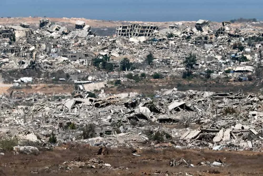 Lebih 88 peratus kawasan di wilayah itu telah musnah sepenuhnya akibat kempen pengeboman yang dilancarkan Zionis selama 22 bulan. Foto AFP