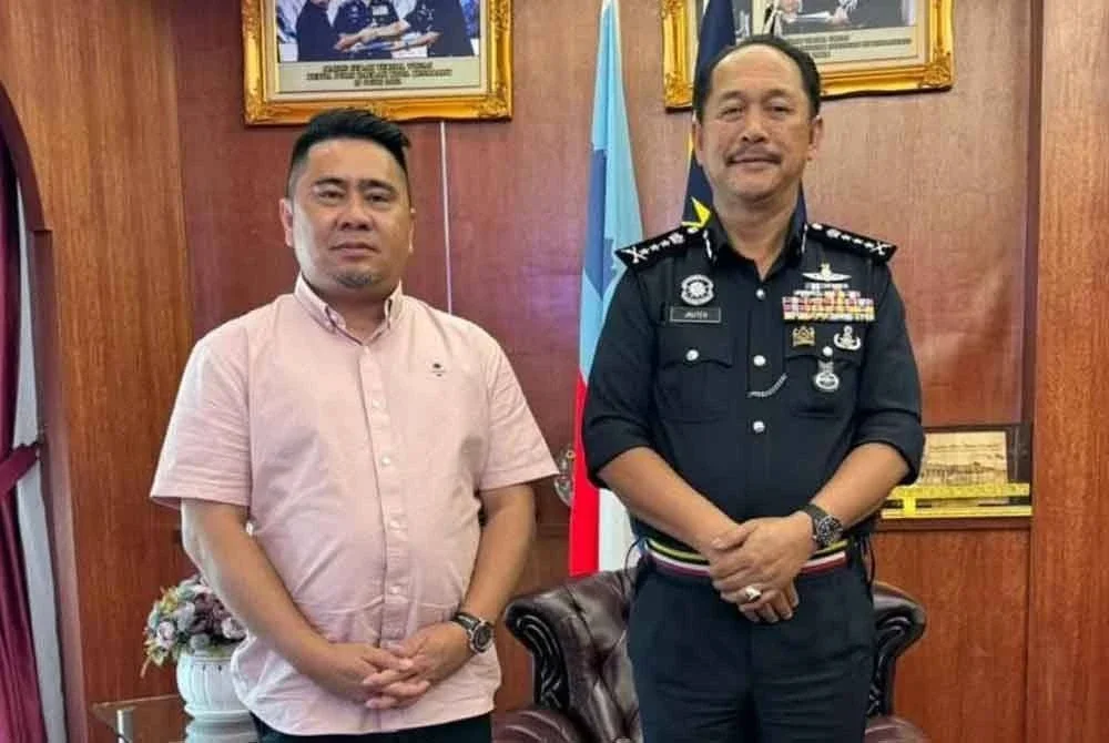 Fairuz (kiri) ketika mengadakan kunjungan hormat terhadap Jauteh di Kota Kinabalu pada Khamis.