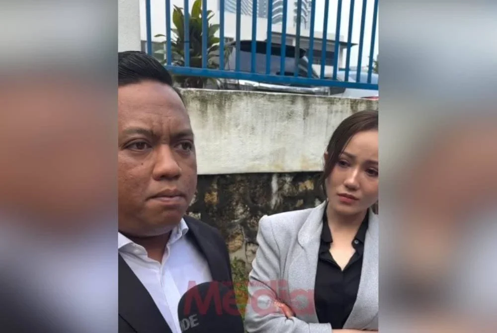 Sophia bersama peguamnya, Aizat.