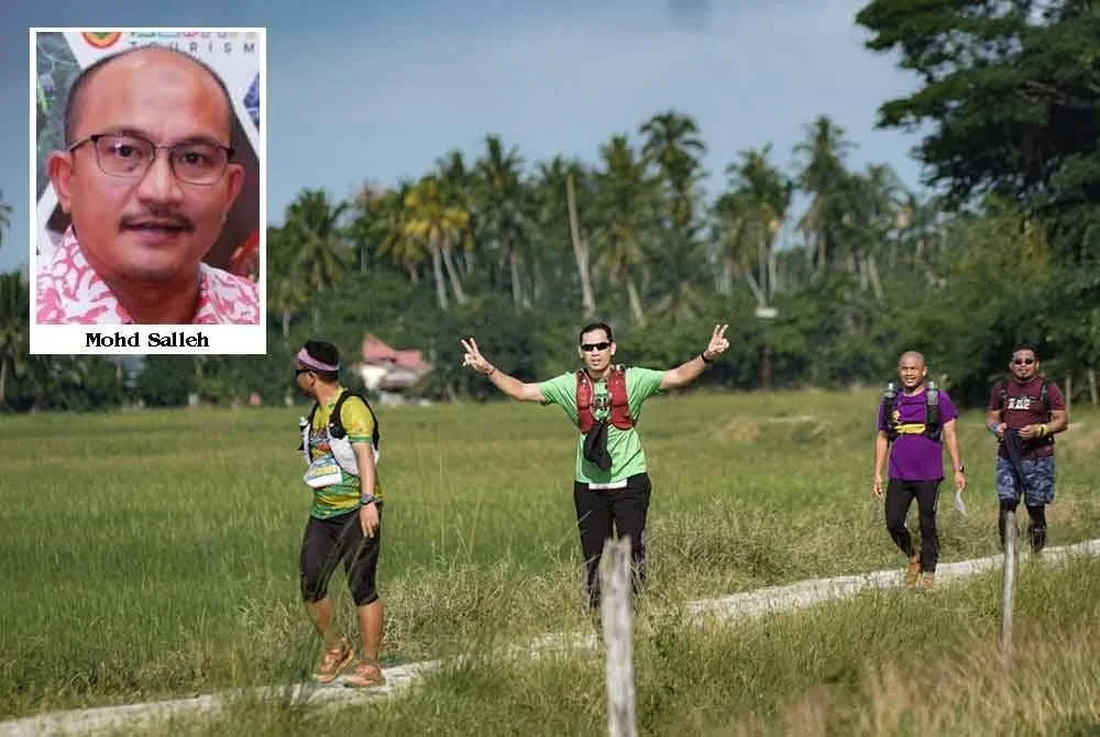 Para peserta turut berpeluang merentasi sawah padi yang menyajikan pemandangan indah. Foto Penganjur.