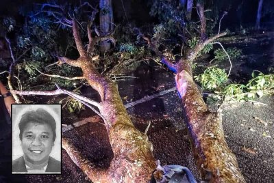 Dahan pokok yang pokok yang patah dan melintang di tengah jalan di Lebuh Alor Gajah-Melaka Tengah-Jasin (AMJ) berhampiran kawasan Kandang awal pagi Selasa.