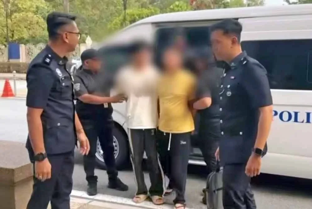 Dua warga China dituduh di Mahkamah Kuala Lumpur pada Rabu. Foto PDRM
