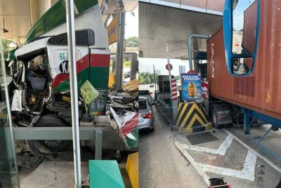 Keadaan treler yang terbabas di Plaza Tol Perling menghala ke Gelang Patah pada Rabu