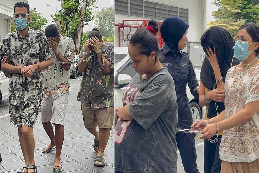 Kelima-lima mereka memarahi jurugambar yang merakam wajah mereka dengan menggunakan kata kesat.