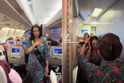 Zuhaimi melakukan walk of honour buat kali terakhir di lorong pesawat sambil diiringi tepukan penumpang.