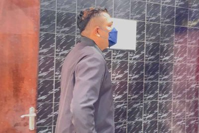 Tertuduh hadir ke Mahkamah Sesyen Khas Rasuah Butterworth bagi menghadapi dua pertuduhan pada Rabu.