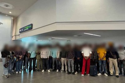 AKPS mengambil tindakan NTL terhadap 126 warga asing yang ditahan di KLIA pada Selasa. Foto AKPS