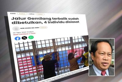 Laporan Sinar Harian mengenai Jalur Gemilang yang dipasang terbalik di sebuah klinik di Pontian sudah dibetulkan. Gambar kecil: Ahmad