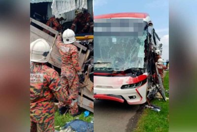 Anggota bomba berusaha mengeluarkan mangsa yang terlibat dalam kemalangan membabitkan bas ekspres dan treler di Kilometer 152.4 Lebuhraya Utara-Selatan (PLUS), arah selatan pada pagi Sabtu. - Foto: BBP Bukit Gambir