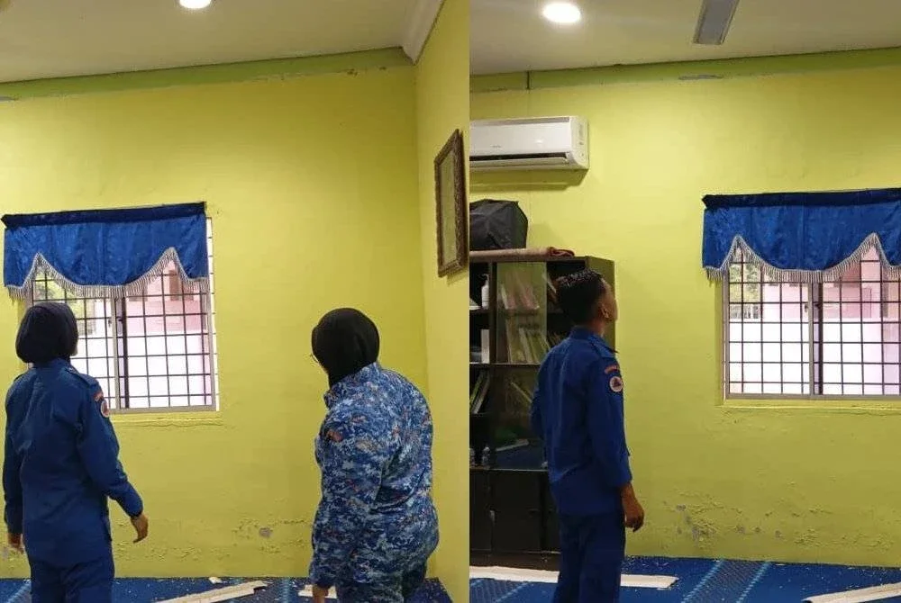 Anggota APM melihat keadaan Surau Kampung Sanglang Buloh Kasap Segamat yang terjejas akibat gegaran gempa bumi pada awal pagi Ahad. Foto APM Johor