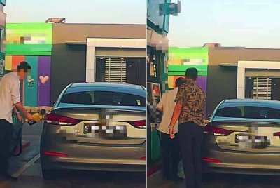 Tangkap layar tular menunjukkan sebuah kereta bernombor pendaftaran Singapura mengisi RON95 di sebuah stesen minyak di Johor Bahru. - Foto: Tular media sosial