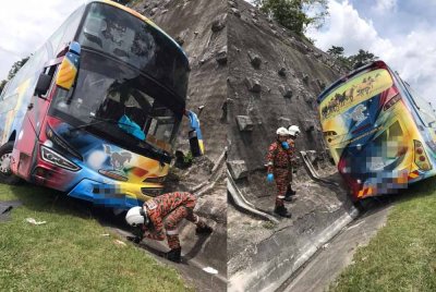 Sebuah bas ekspres dua tingkat terbabas ke dalam longkang di Lebuhraya Utara-Selatan berhampiran Sungkai. Foto Bomba Perak
