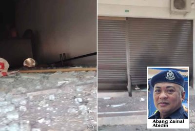 Letupan tahap rendah itu telah merosakkan bahagian pintu dan lantai sebuah kedai di Ipoh. Foto: Ihsan pembaca