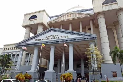 Dua ibu tunggal didakwa di Mahkamah Sesyen Kuala Lumpur hari ini atas pertuduhan melakukan pecah amanah wang tunai lebih RM75,000 milik JMB sebuah kondominium, tiga tahun lepas. - Gambar hiasan