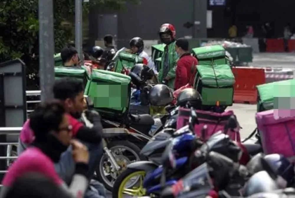 RUU Pekerja Gig 2025 diluluskan di Dewan Rakyat, memberi perlindungan undang-undang kepada lebih 1.2 juta pekerja gig Malaysia termasuk e-hailing dan penghantaran makanan. Gambar hiasan